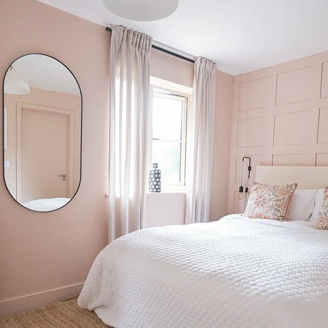 Dusty pink bedroom painted in Farrow and Ball Setting Plaster with Scandi styling