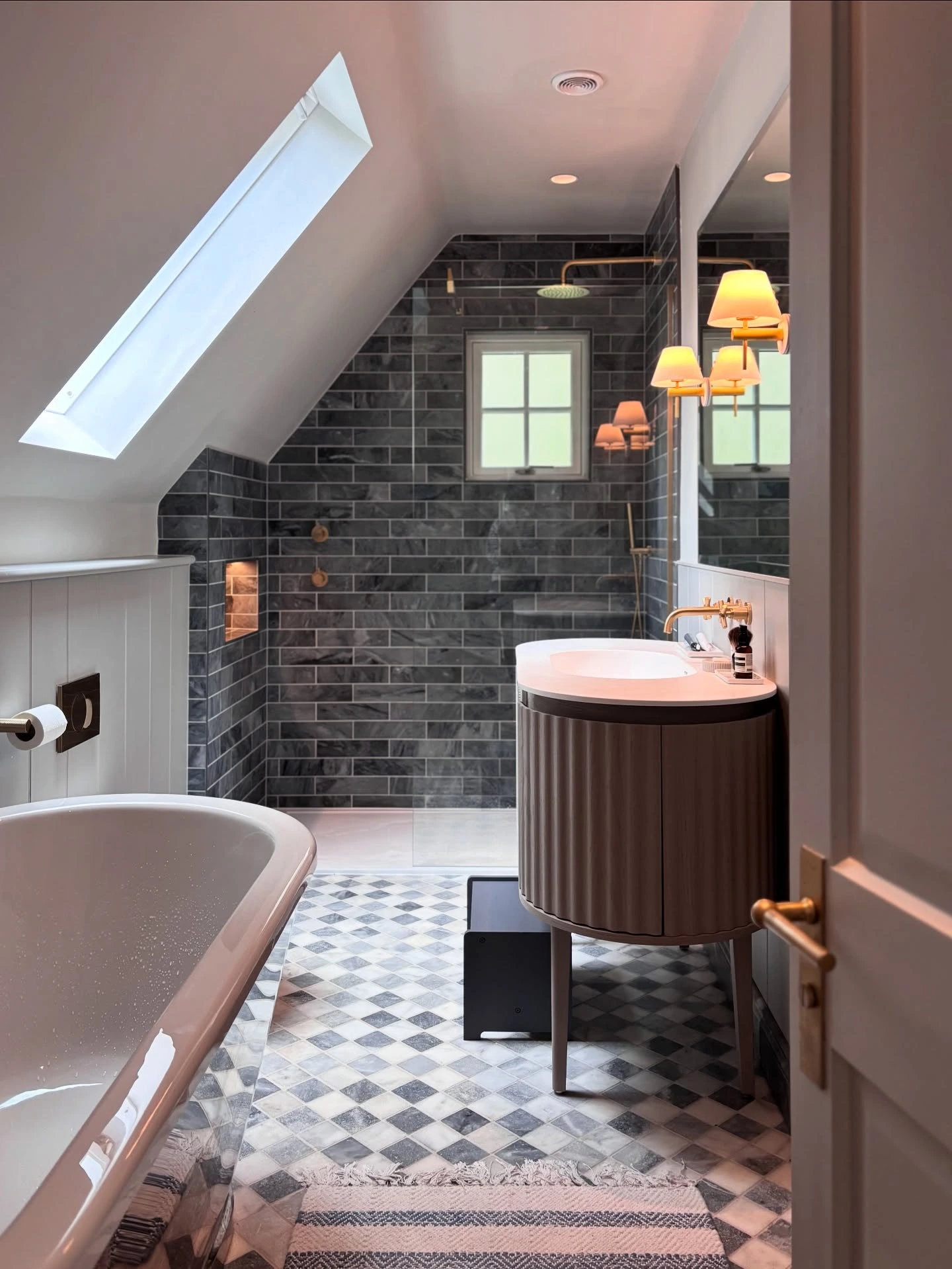 Fluted vanity unit with reeded detail adding texture to a small bathroom