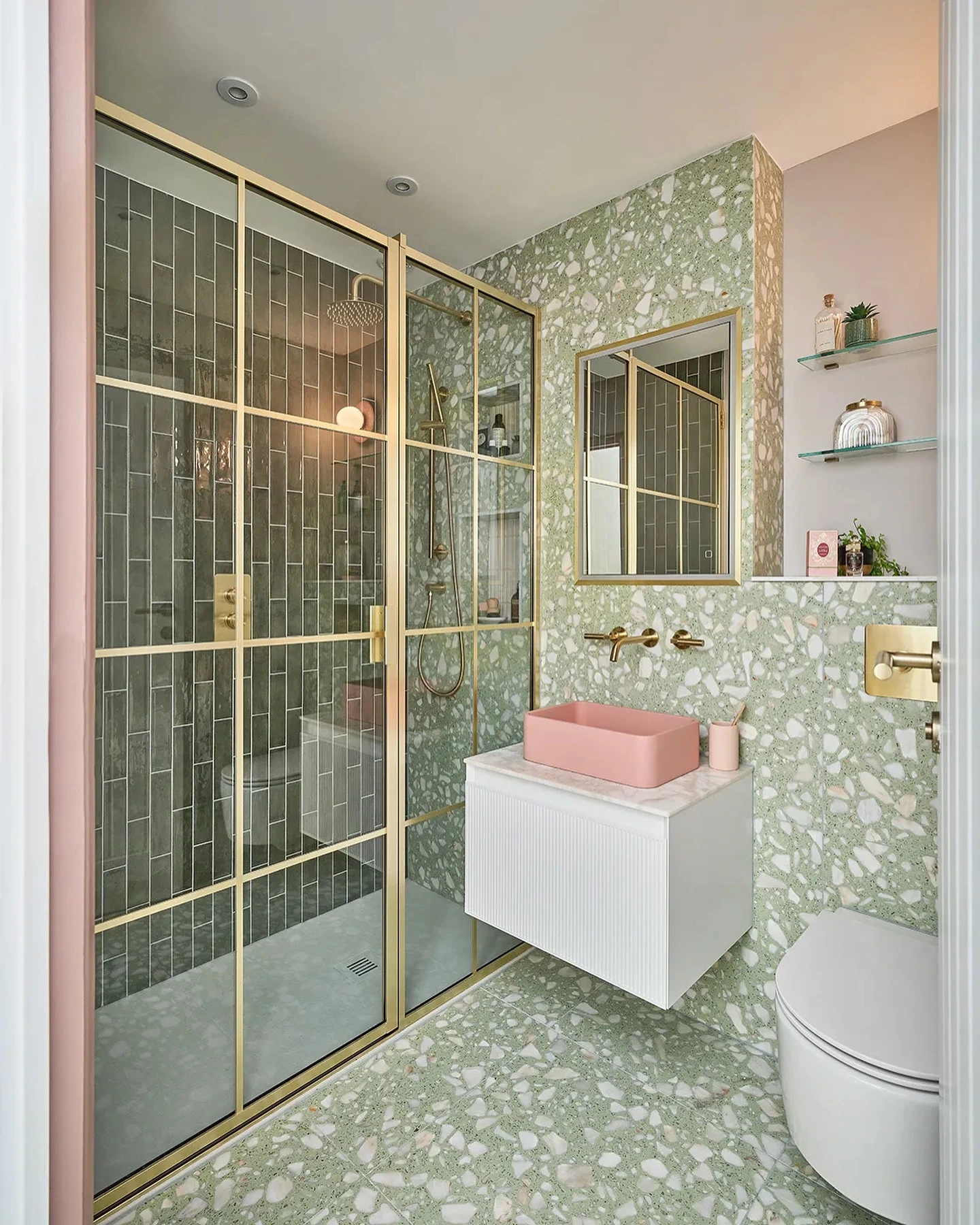 Bold patterned tiles in a small bathroom design with vibrant colours