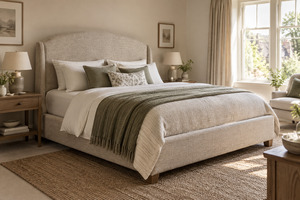 An upholstered bed creates a strong focal point, but mattress size, support, storage access and fabric care should guide the decision before colour.